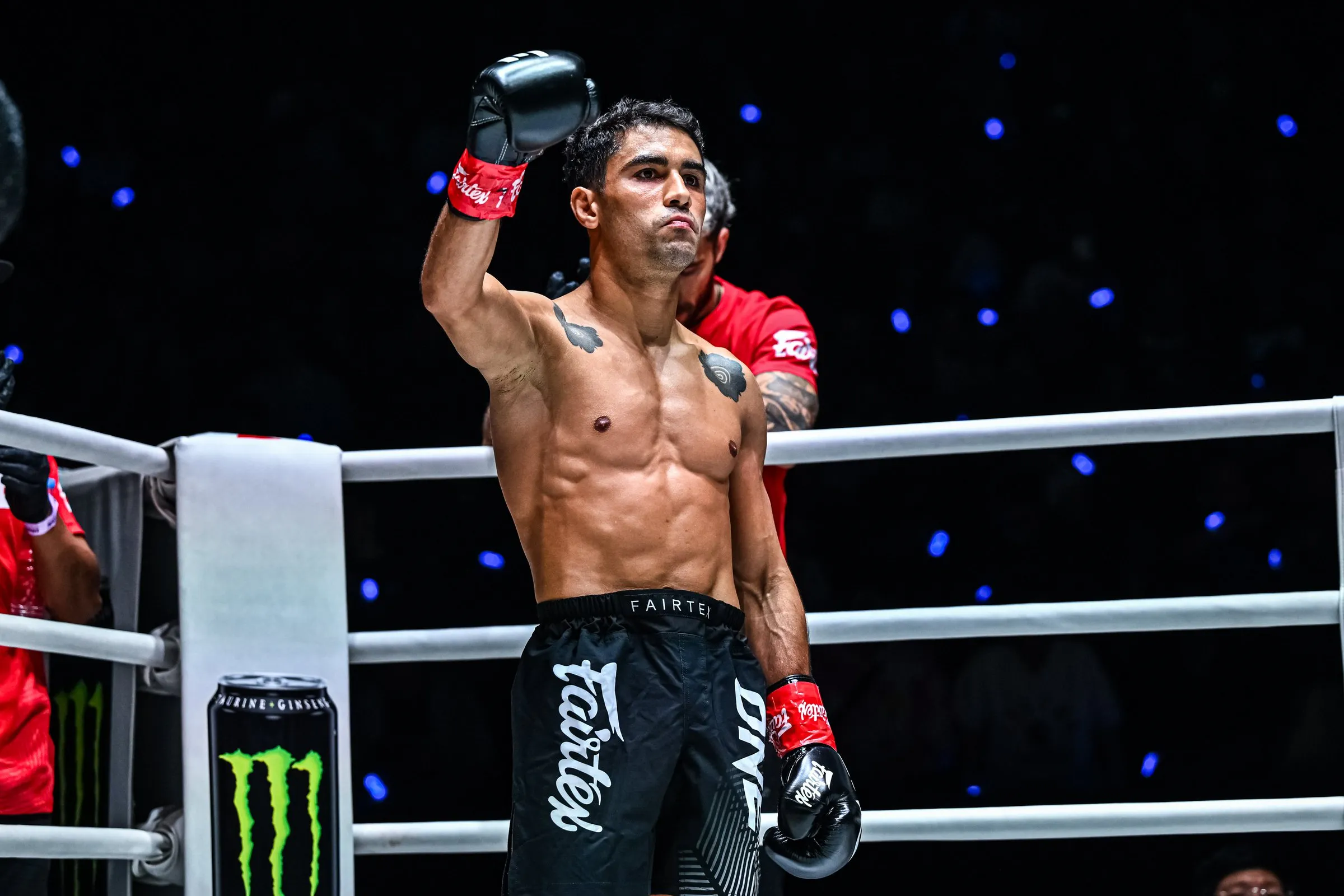 Rui Botelho raising a glove in the ring after a ONE Championship bout